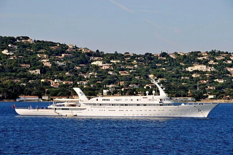 a large white ship in the water aboard ATLANTIS II Yacht for Sale