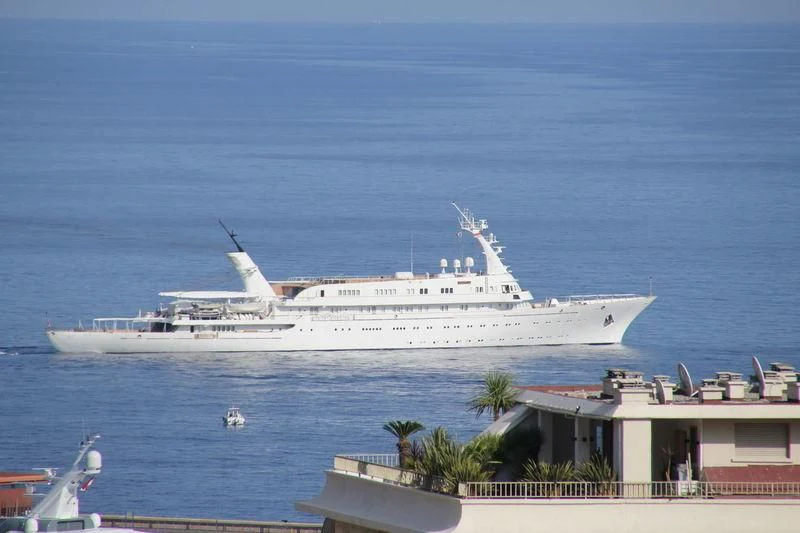 a large white ship in the water aboard ATLANTIS II Yacht for Sale
