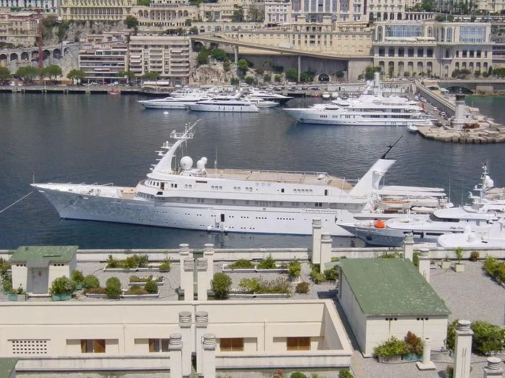 a large ship in the water aboard ATLANTIS II Yacht for Sale