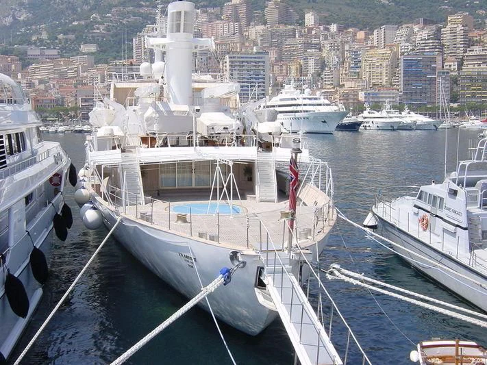 a large ship in the water aboard ATLANTIS II Yacht for Sale