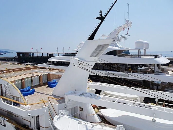 a boat docked at a pier aboard ATLANTIS II Yacht for Sale