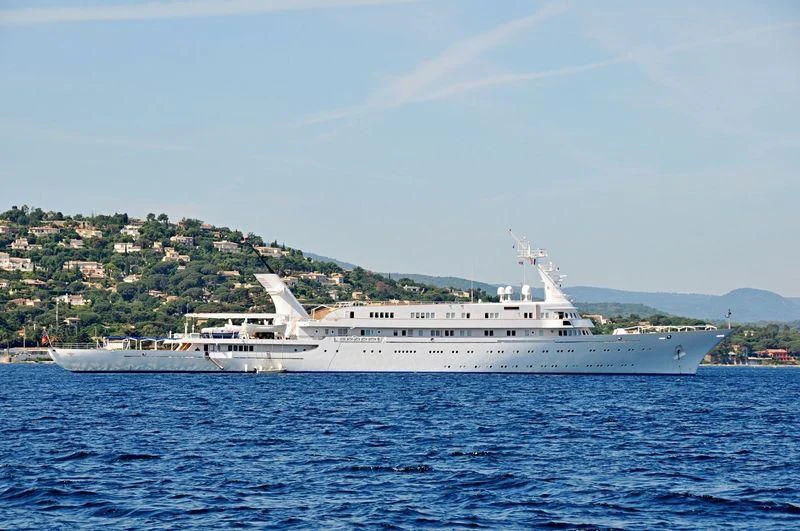 a large white ship in the water aboard ATLANTIS II Yacht for Sale