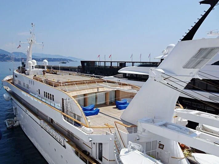 a couple of boats are parked in a harbor aboard ATLANTIS II Yacht for Sale