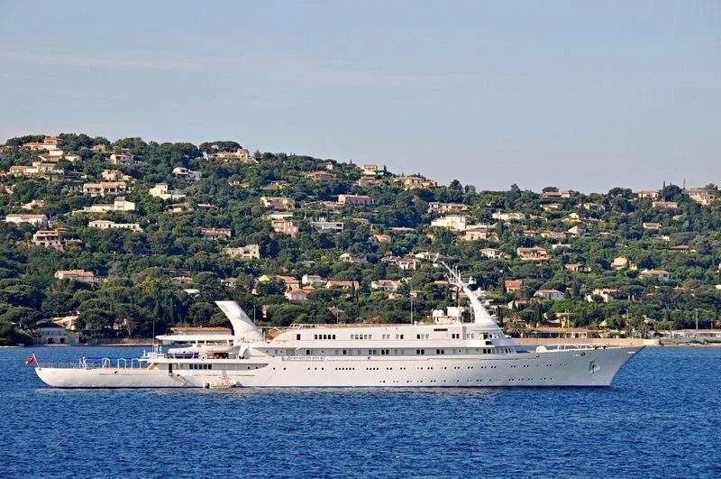 a large ship in the water aboard ATLANTIS II Yacht for Sale