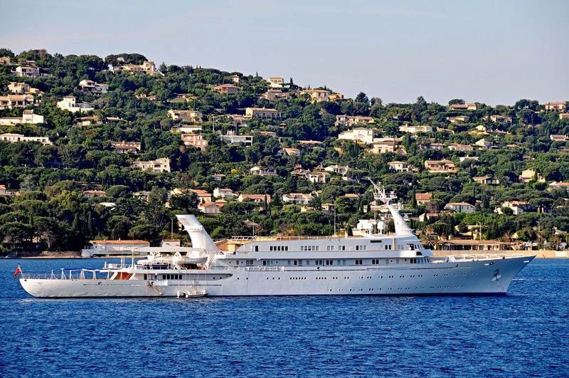 a large white boat in the water aboard ATLANTIS II Yacht for Sale