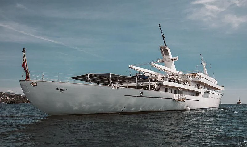 a large white ship in the water aboard ATLANTIS II Yacht for Sale