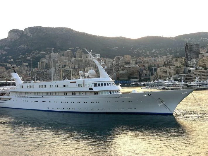 a white yacht in the water aboard ATLANTIS II Yacht for Sale