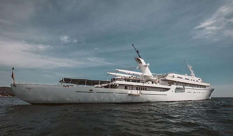 a large white boat in the water aboard ATLANTIS II Yacht for Sale