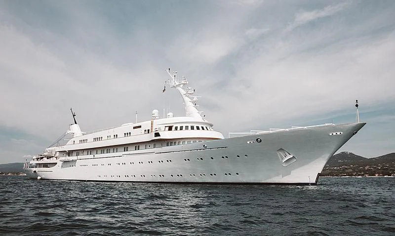 a large white ship in the water aboard ATLANTIS II Yacht for Sale