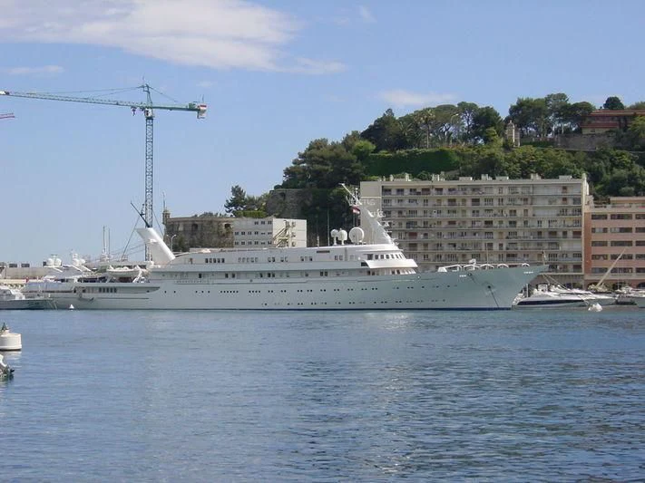 a large white ship in the water aboard ATLANTIS II Yacht for Sale