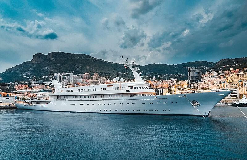 a large white ship in the water aboard ATLANTIS II Yacht for Sale