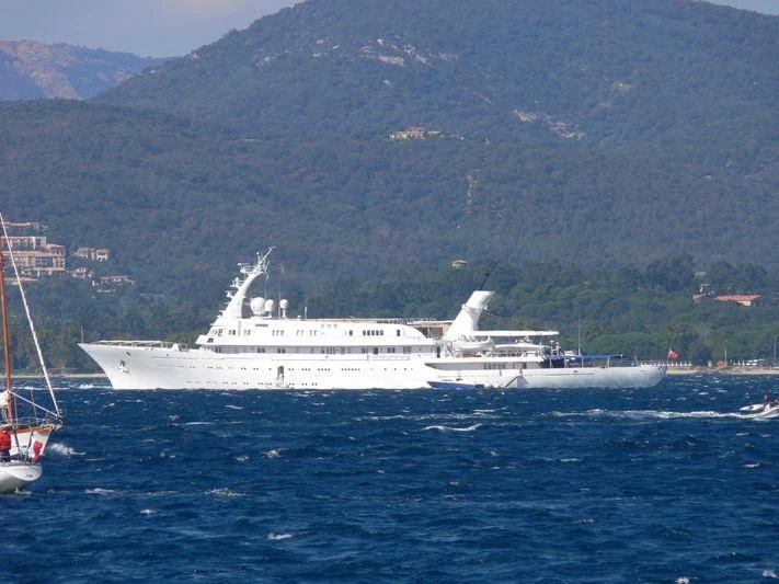 a large white ship in the water aboard ATLANTIS II Yacht for Sale