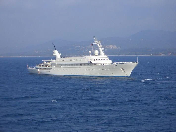 a white boat in the water aboard ATLANTIS II Yacht for Sale