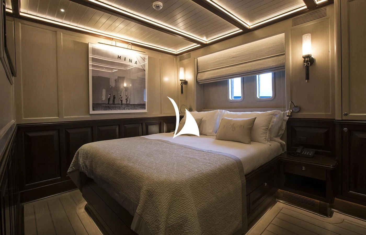 a bed in a room aboard SATORI Yacht for Charter