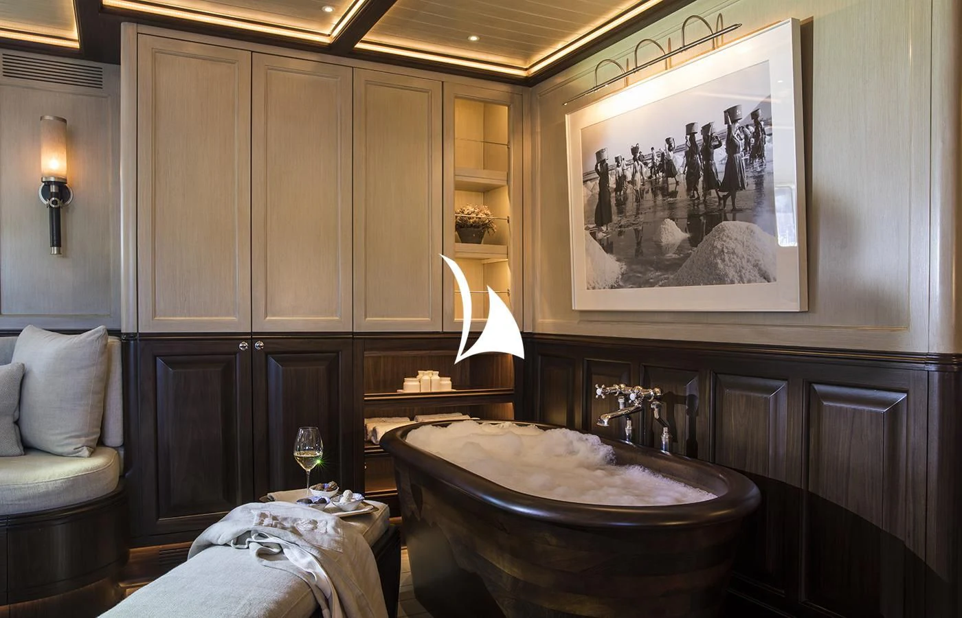 a bathroom with a sink and cabinets aboard SATORI Yacht for Charter
