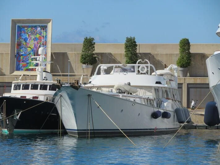a boat docked at a pier aboard MIKADO Yacht for Sale