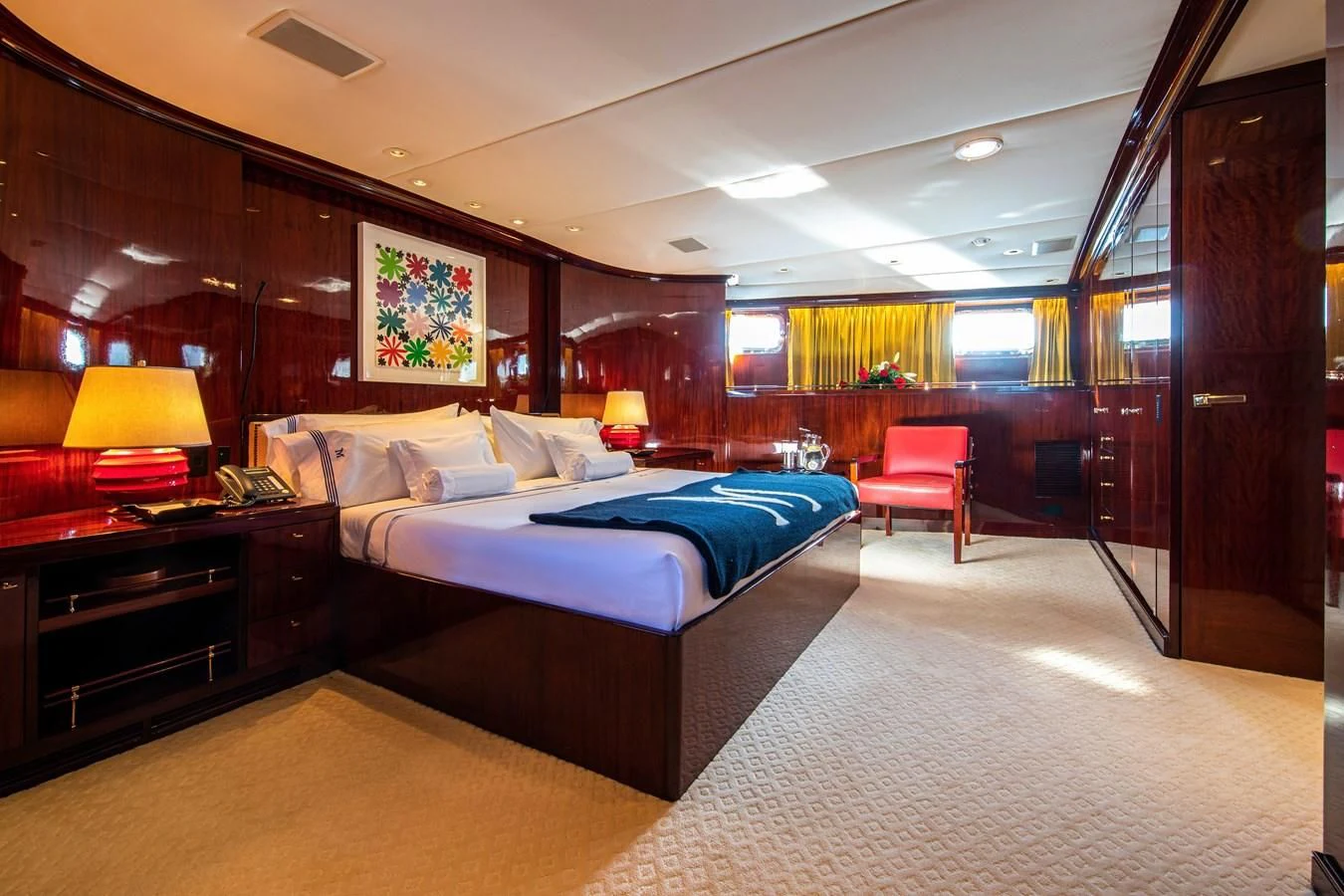 a room with a bed and a desk aboard MIKADO Yacht for Sale