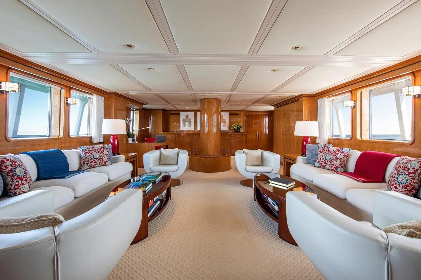 a living room with a large fireplace aboard MIKADO Yacht for Sale