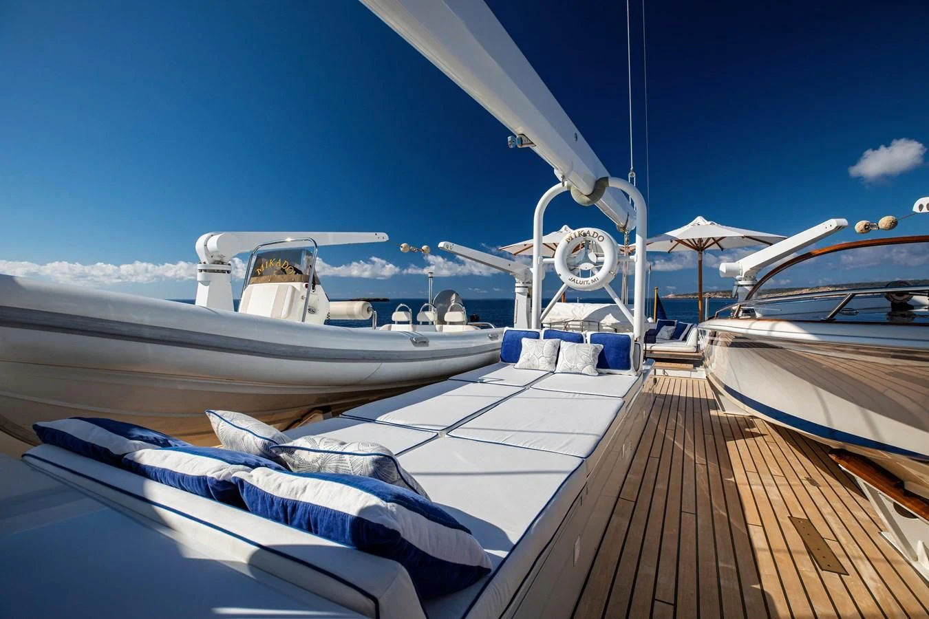 a deck with boats on it aboard MIKADO Yacht for Sale