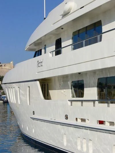 a white boat in the water aboard RAHAL Yacht for Sale