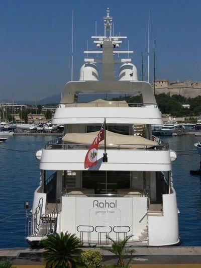 a large white boat in the water aboard RAHAL Yacht for Sale