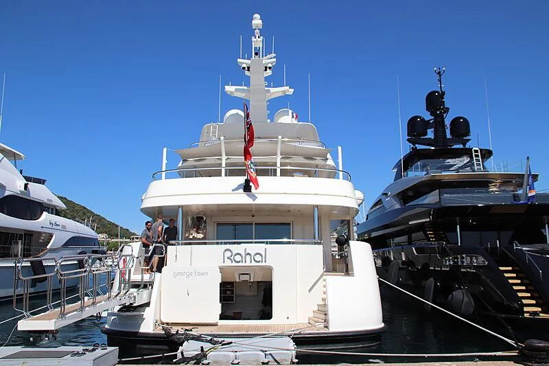 a boat docked at a pier aboard RAHAL Yacht for Sale