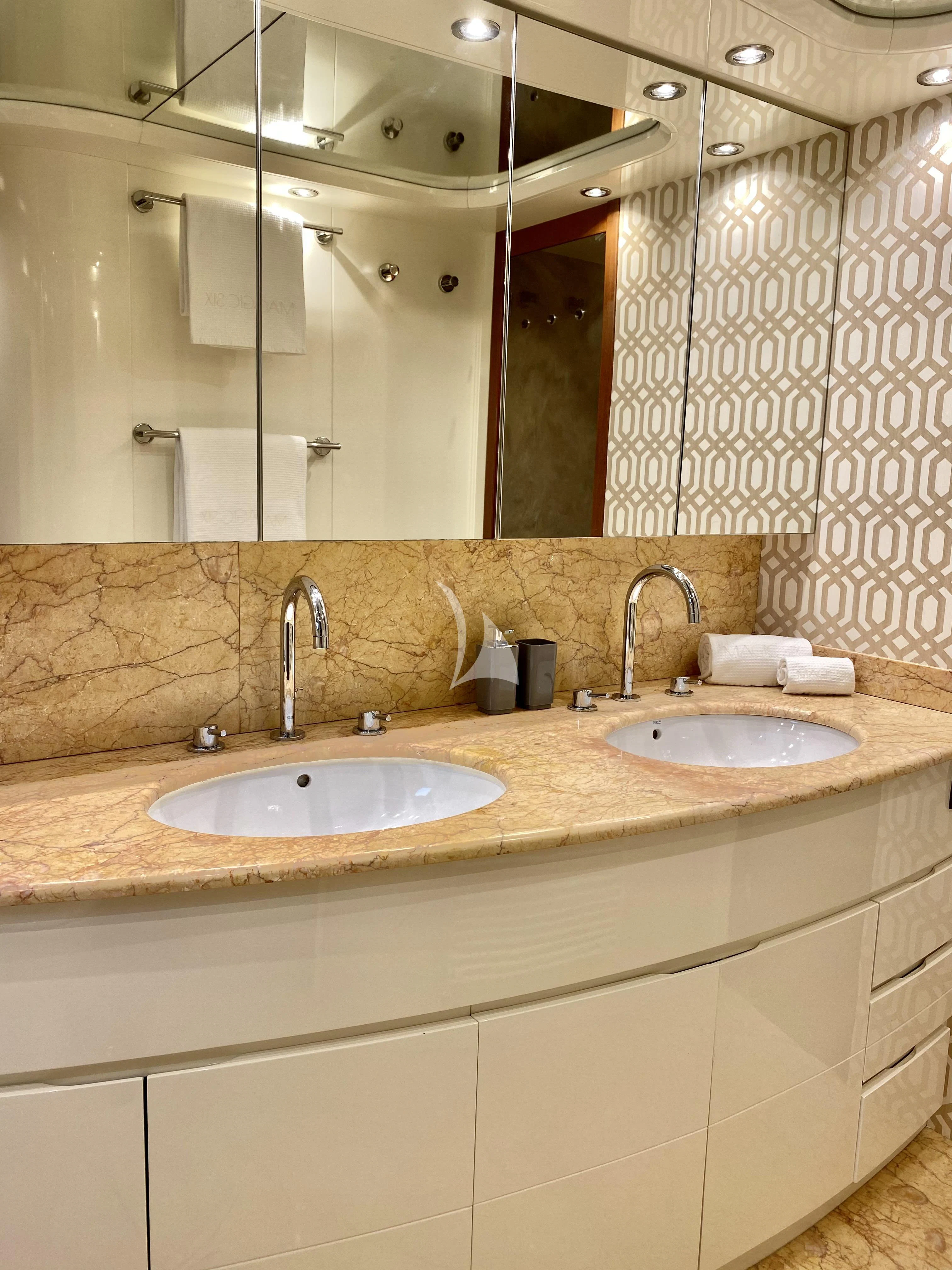 a bathroom with two sinks aboard MAGIC SIX Yacht for Sale