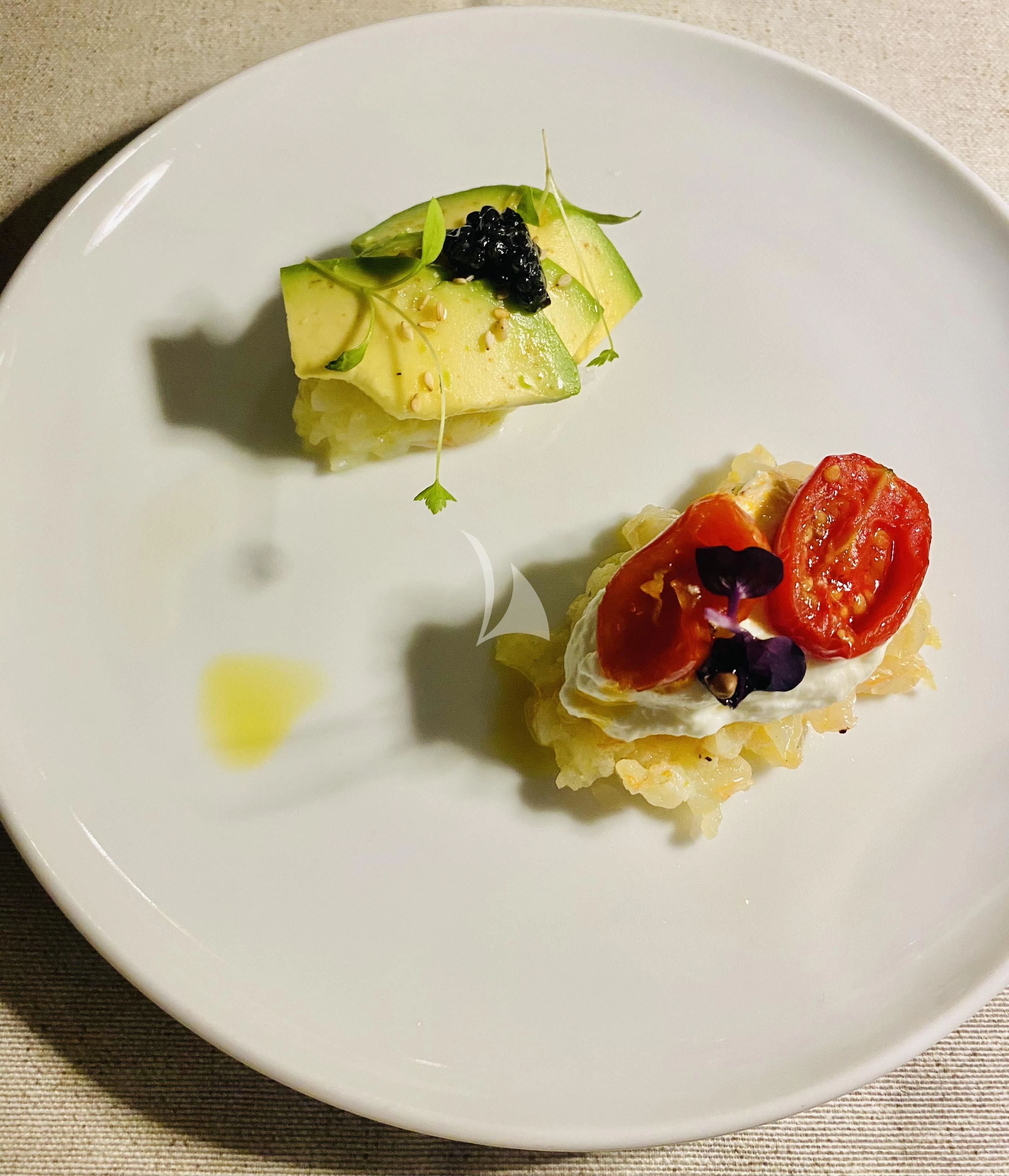 a plate of food aboard MAGIC SIX Yacht for Sale