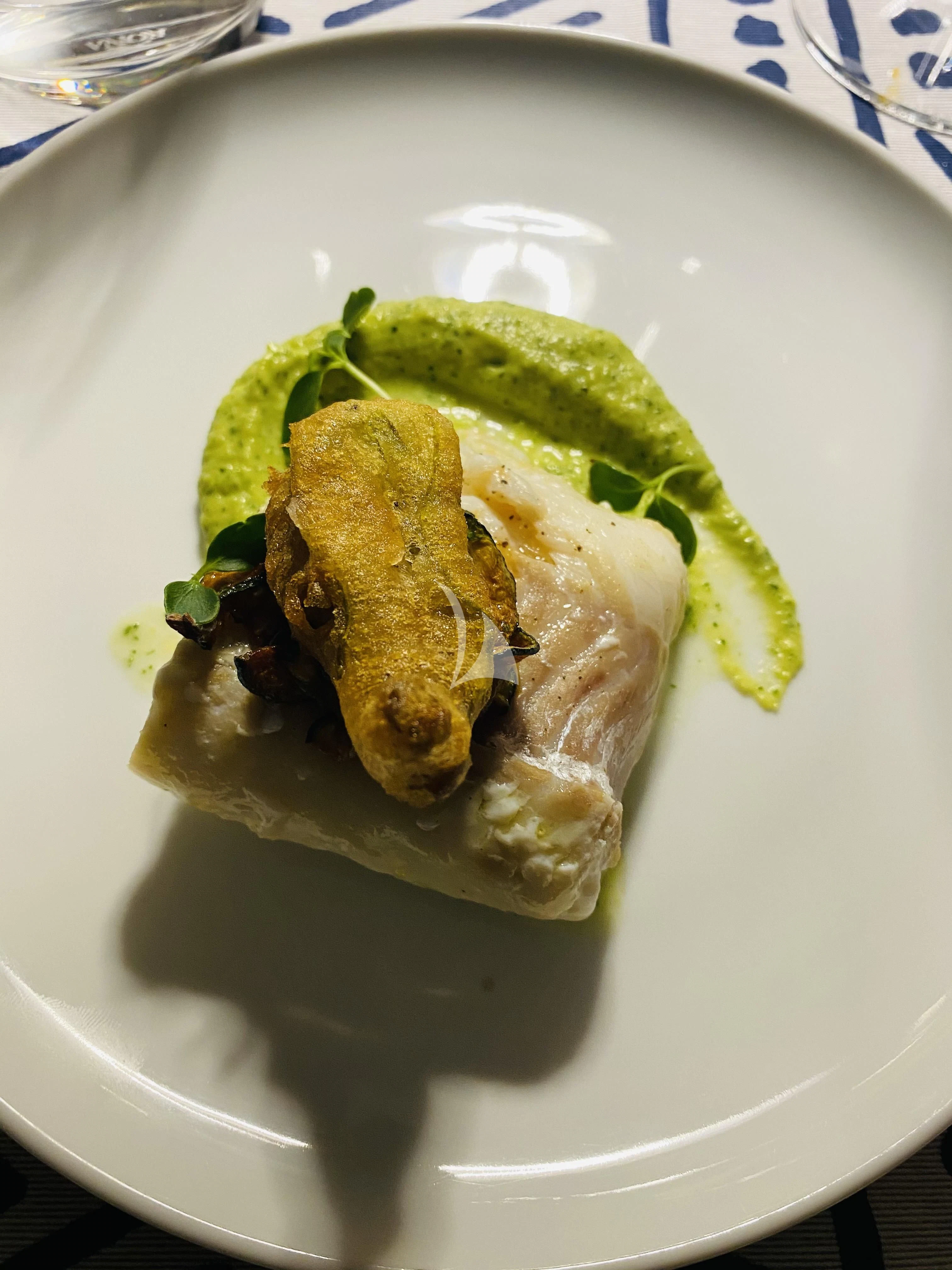 a plate of food aboard MAGIC SIX Yacht for Sale