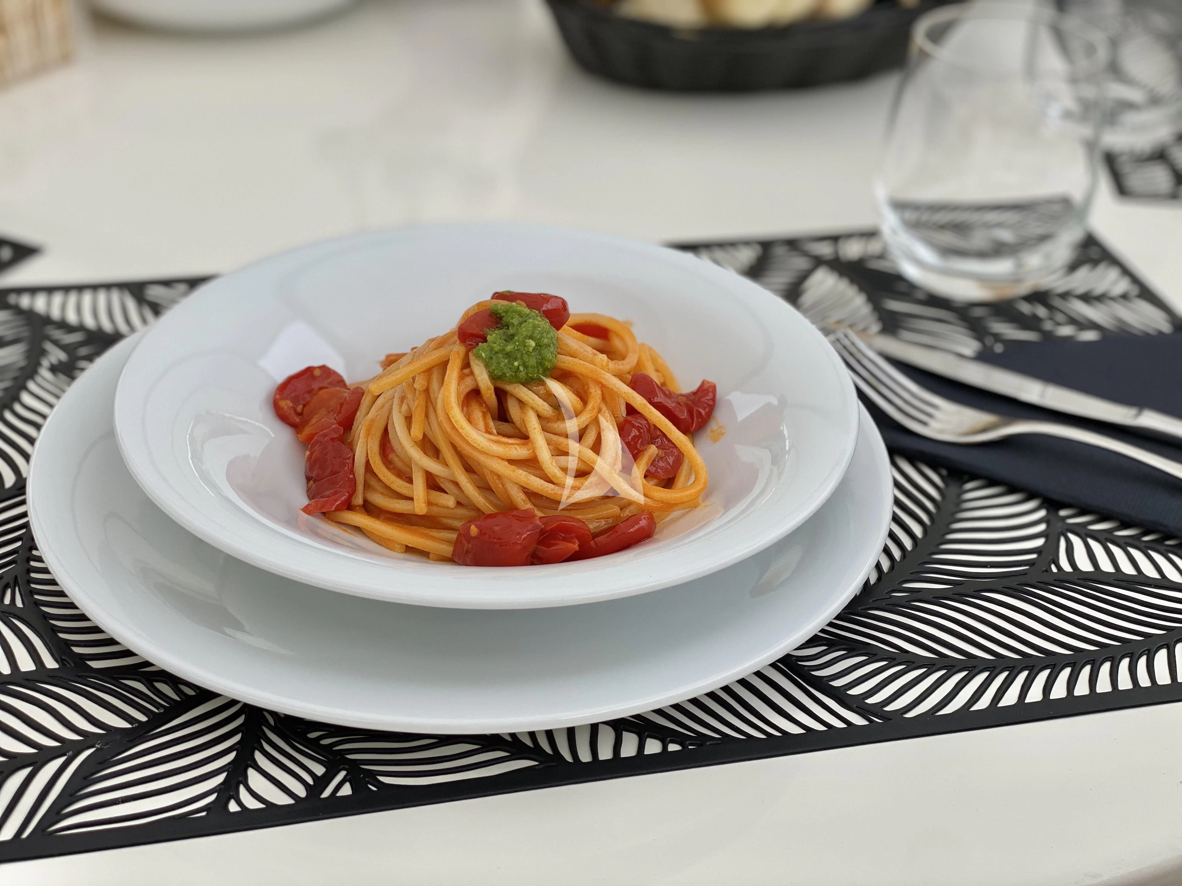a plate of pasta aboard MAGIC SIX Yacht for Sale