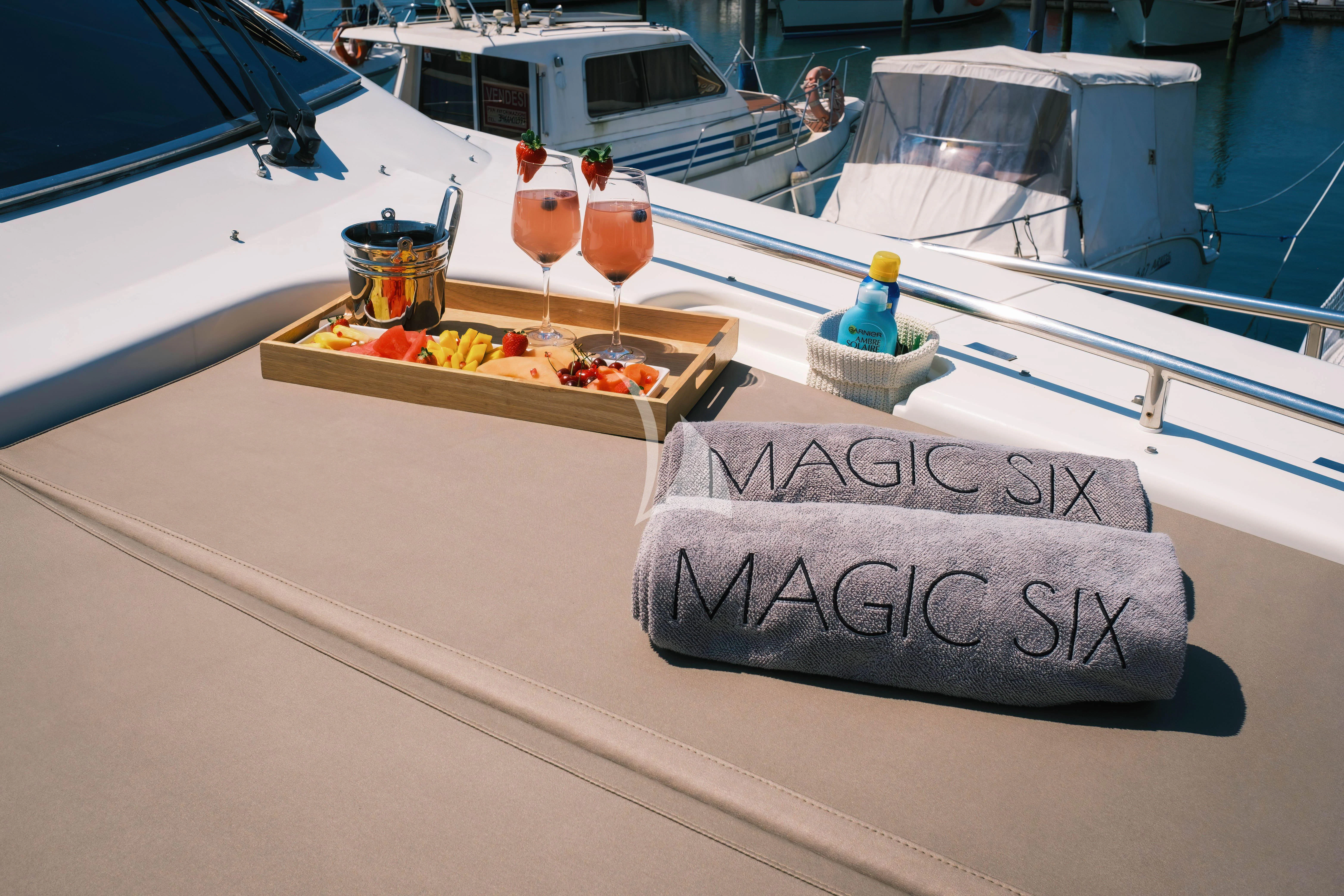 a boat with candles on it aboard MAGIC SIX Yacht for Sale