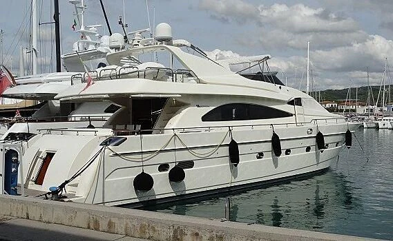 a white yacht docked aboard MAGIC SIX Yacht for Sale