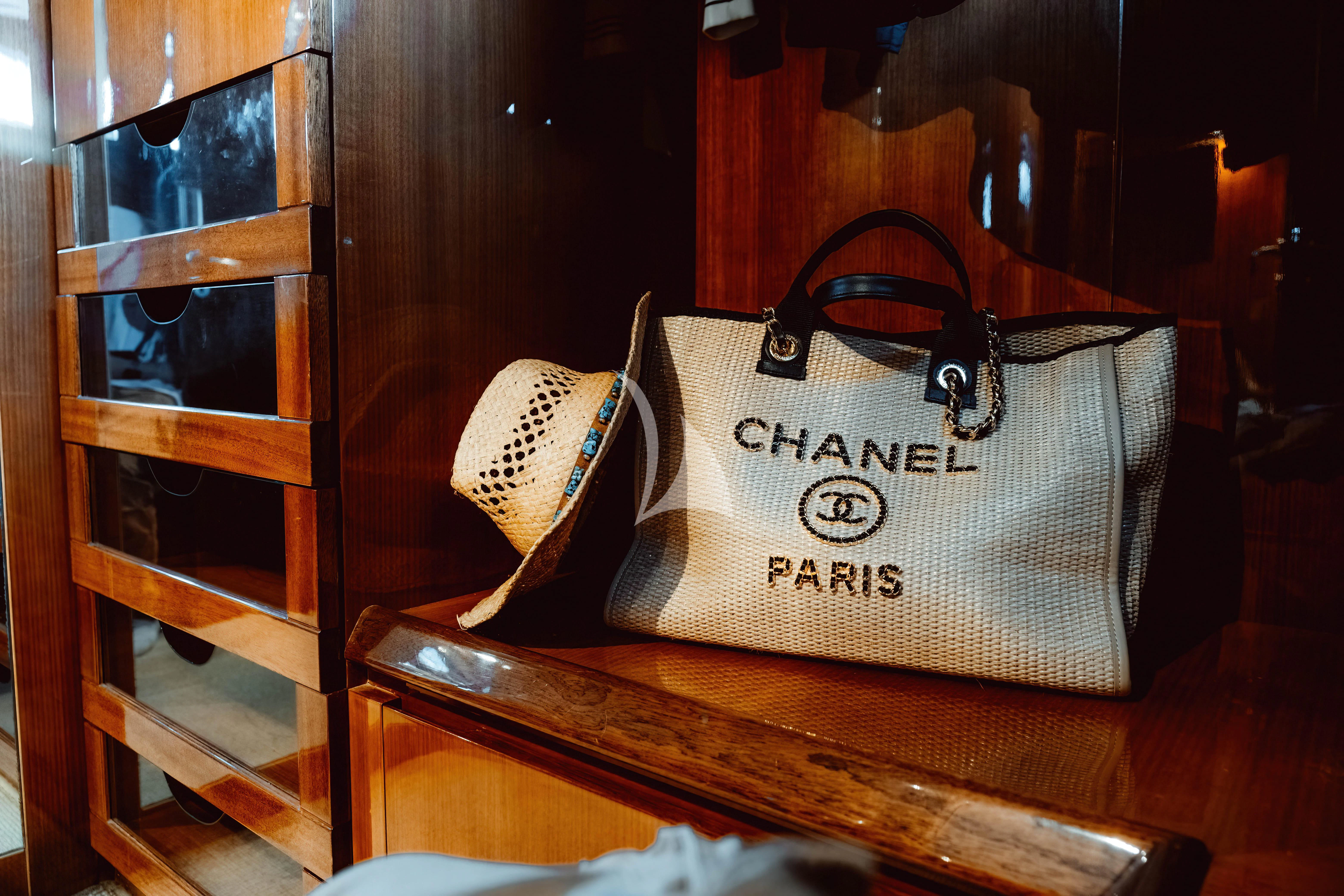 a purse on a table aboard MAGIC SIX Yacht for Sale