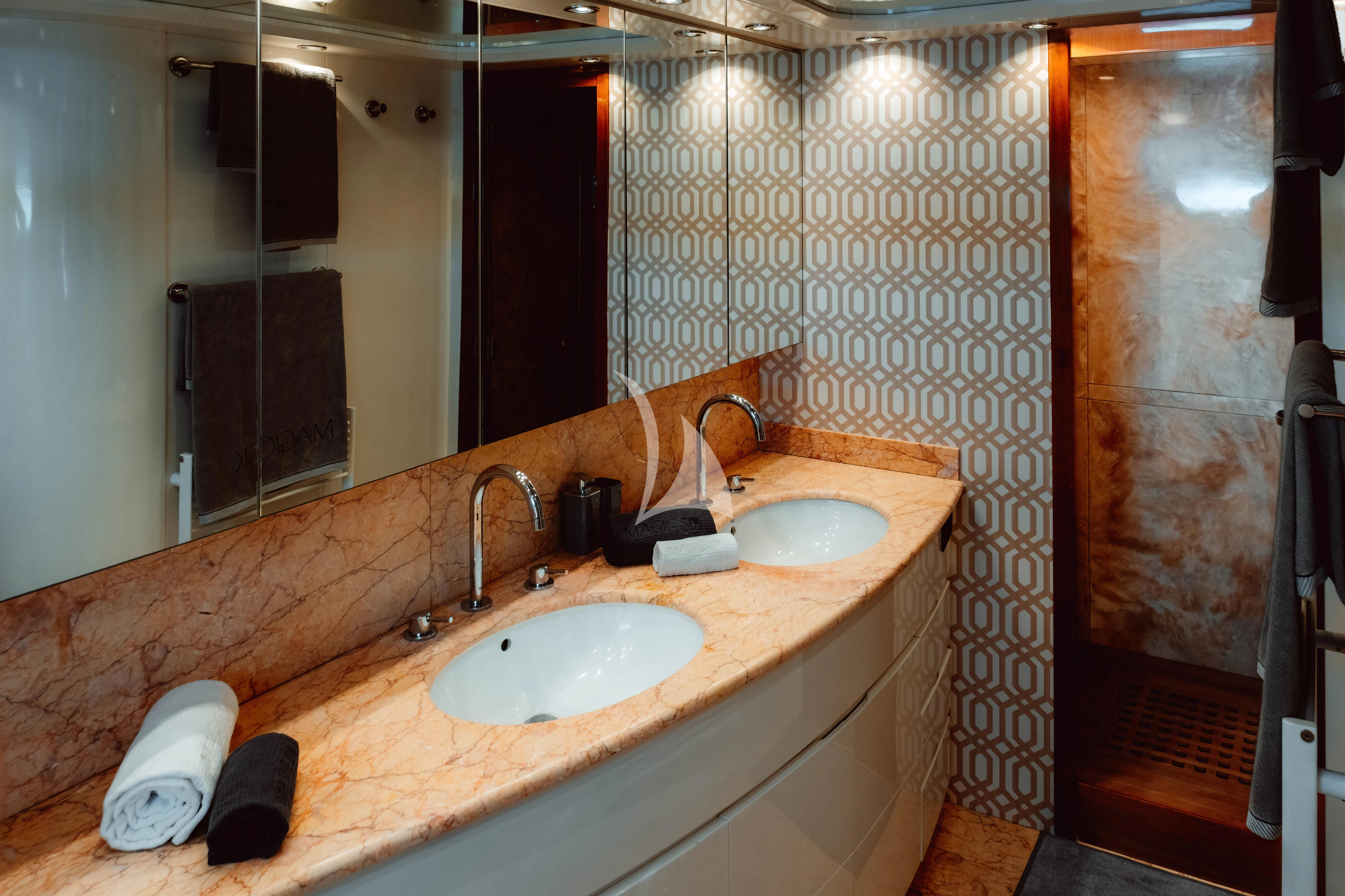 a bathroom with two sinks aboard MAGIC SIX Yacht for Sale