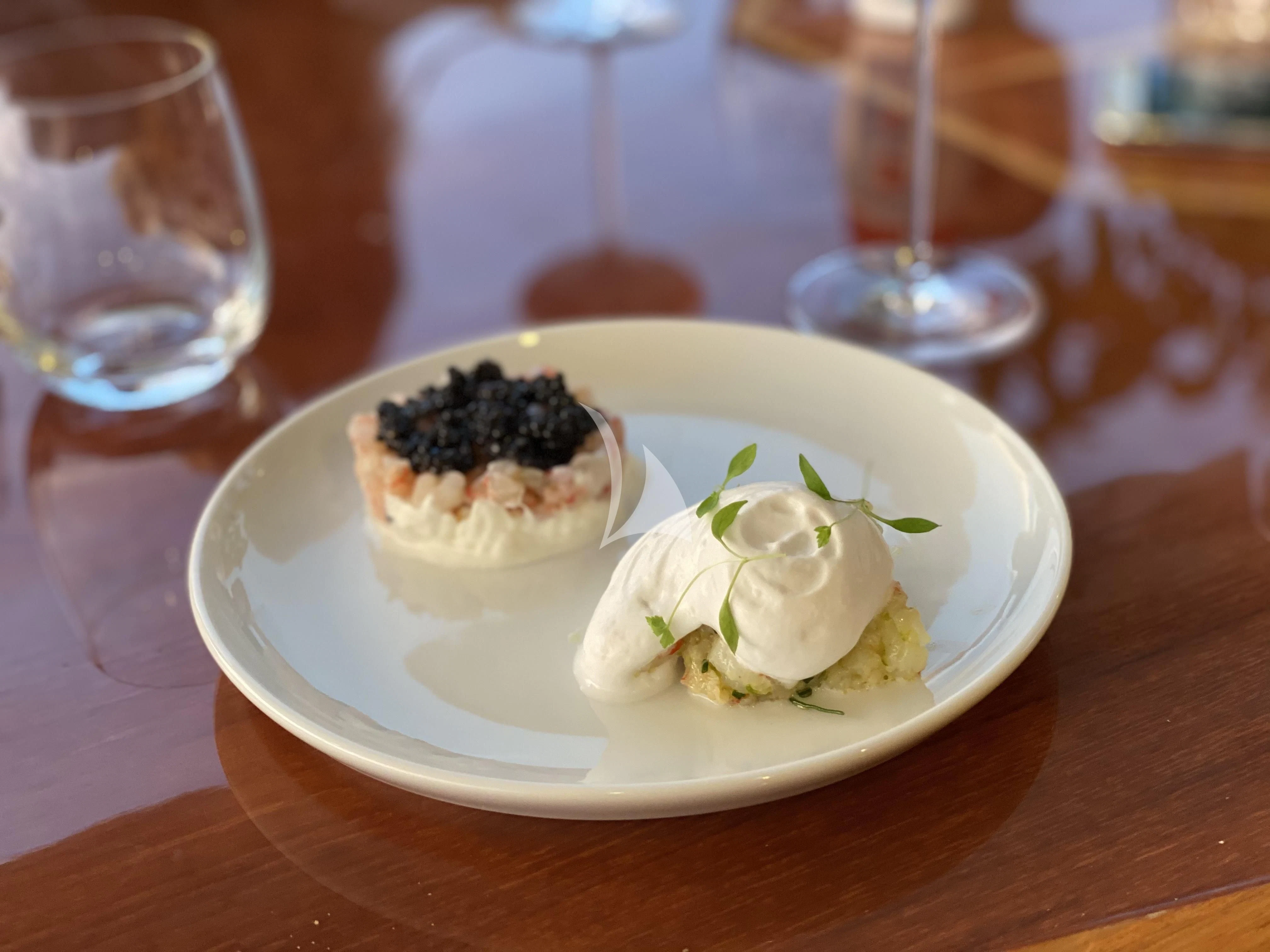 a plate of dessert aboard MAGIC SIX Yacht for Sale