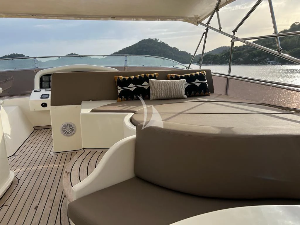 a couch on a deck aboard MAGIC SIX Yacht for Sale