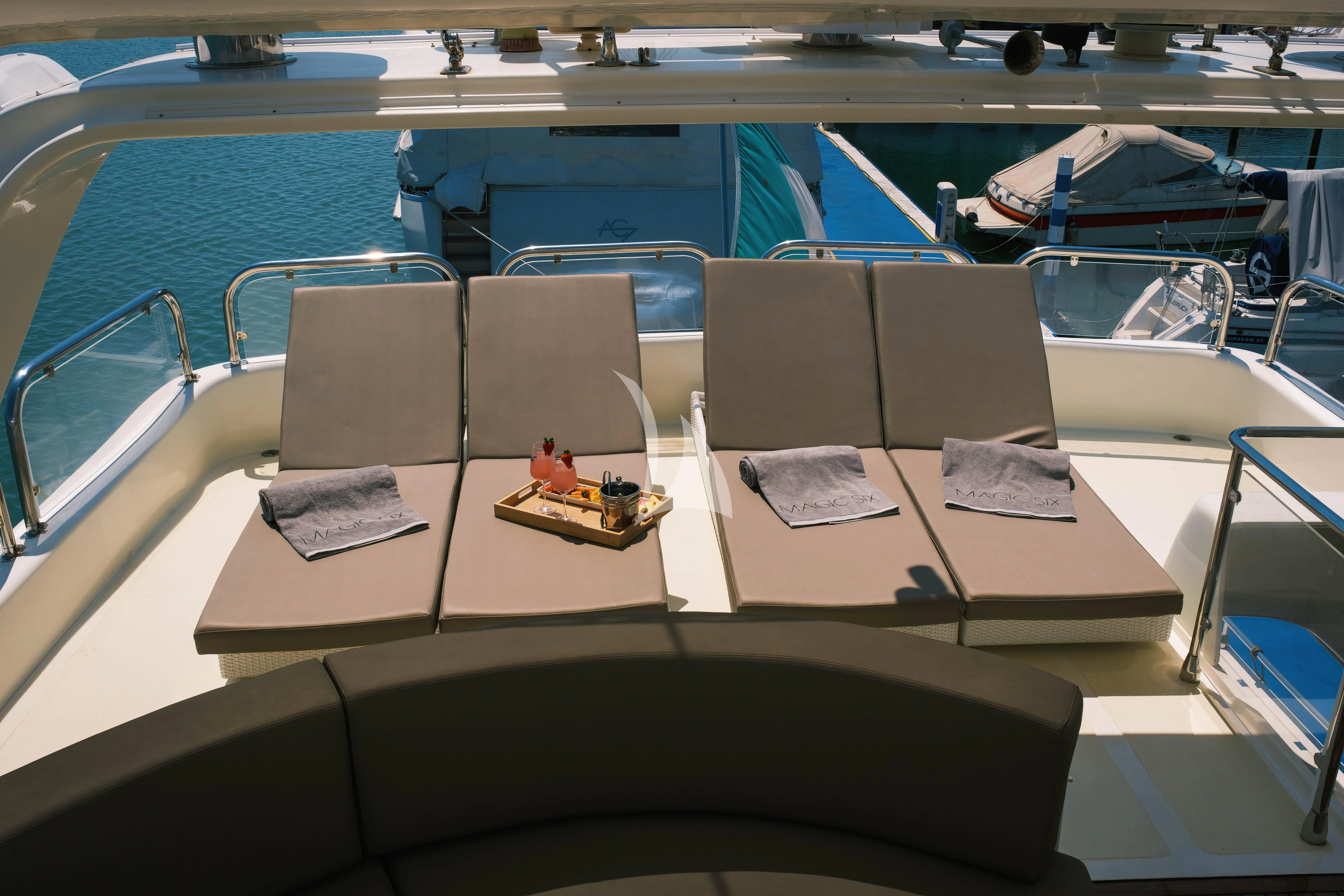 a boat with a desk and chairs aboard MAGIC SIX Yacht for Sale