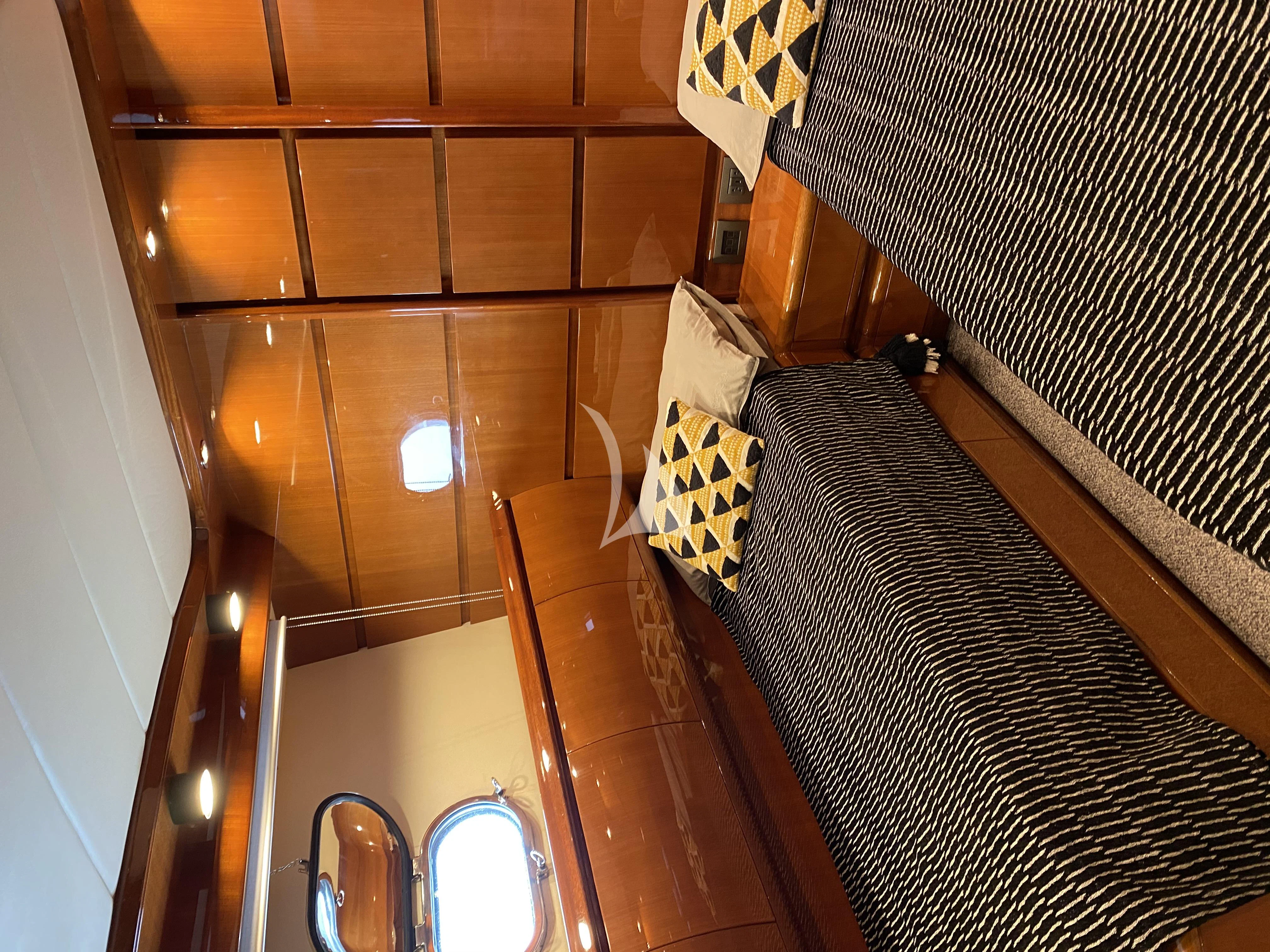 a staircase with a striped floor aboard MAGIC SIX Yacht for Sale