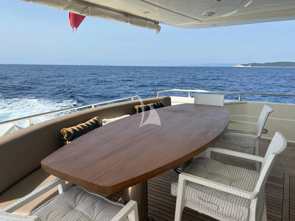 a table on a boat aboard MAGIC SIX Yacht for Sale