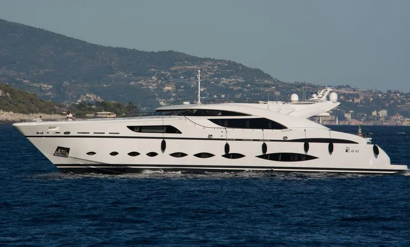 a white yacht in the water aboard FAST & FURIOUS Yacht for Charter