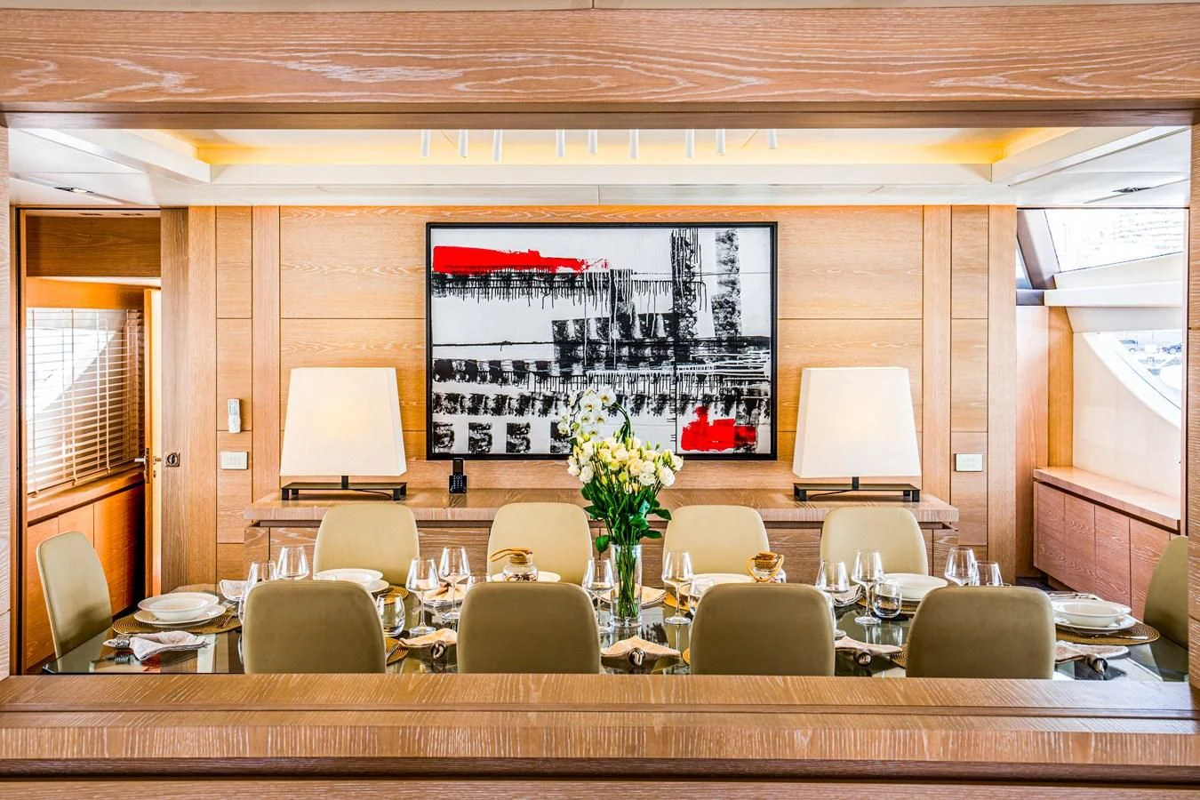 a large room with a large screen aboard FAST & FURIOUS Yacht for Charter