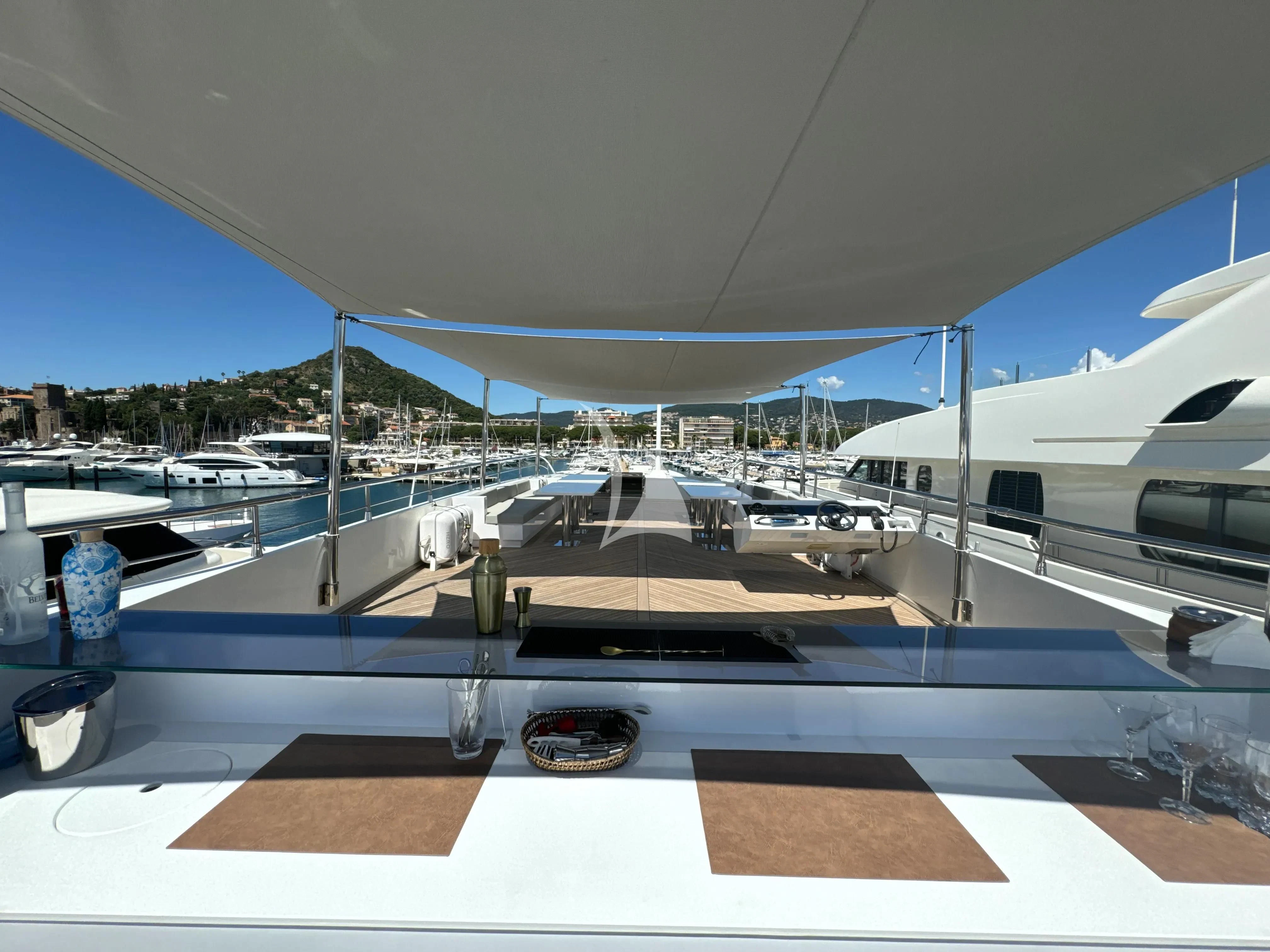 a large white boat with a circular roof aboard FAST & FURIOUS Yacht for Charter