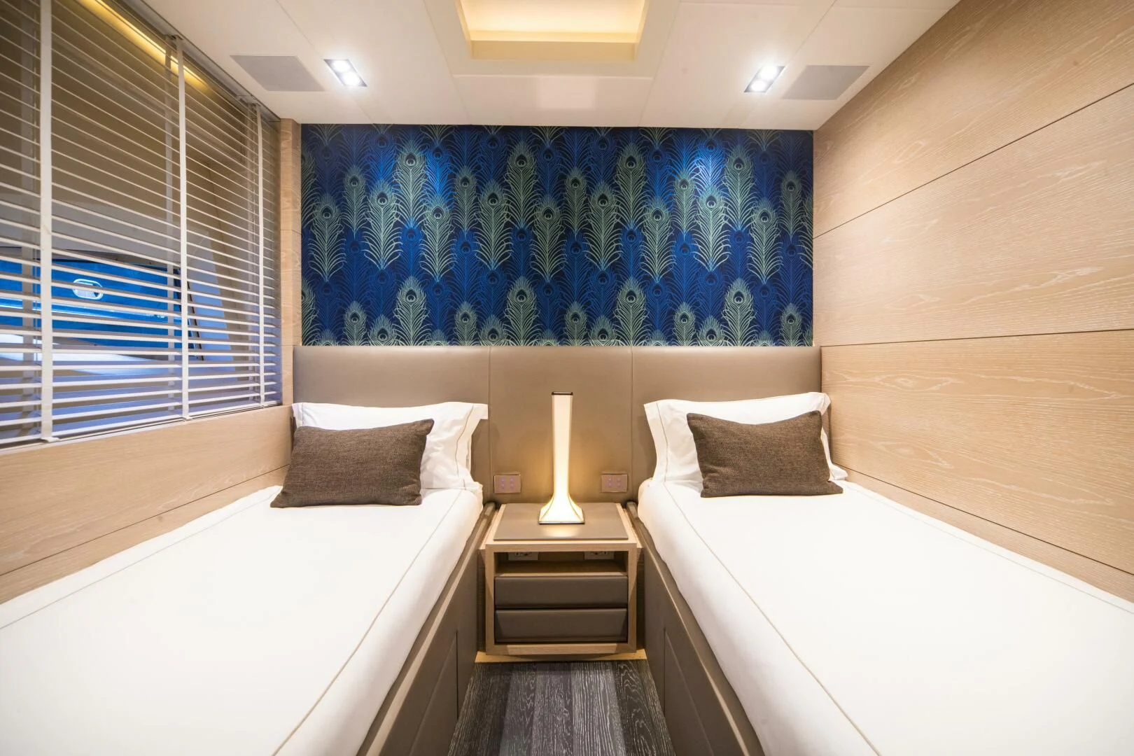 a room with two beds aboard FAST & FURIOUS Yacht for Charter