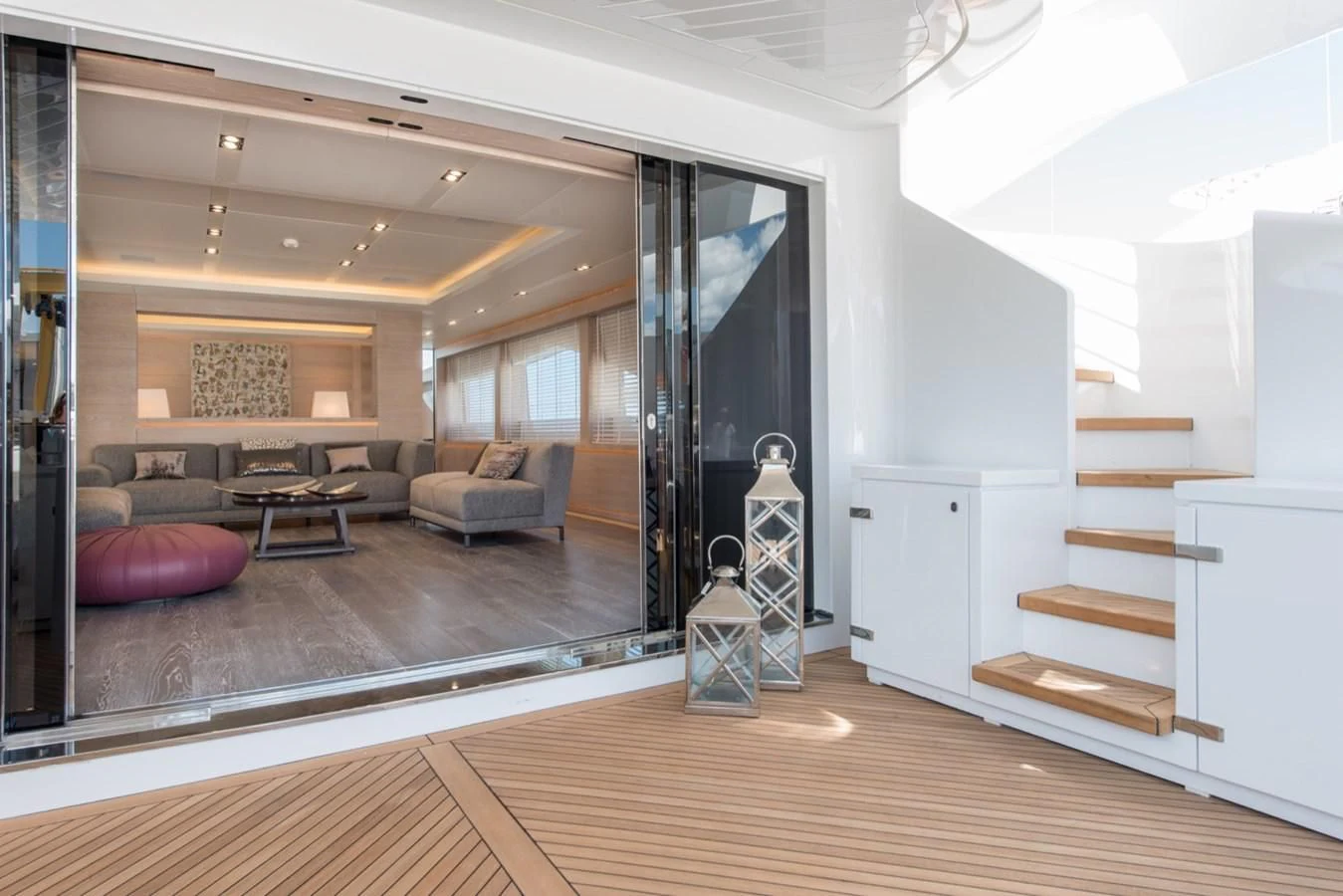 a living room with a wood floor aboard FAST & FURIOUS Yacht for Charter