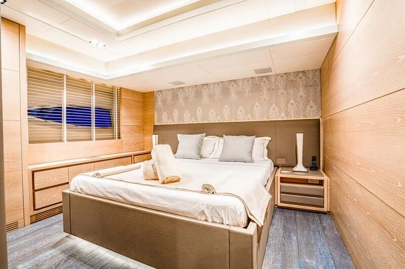 a room with two beds aboard FAST & FURIOUS Yacht for Charter