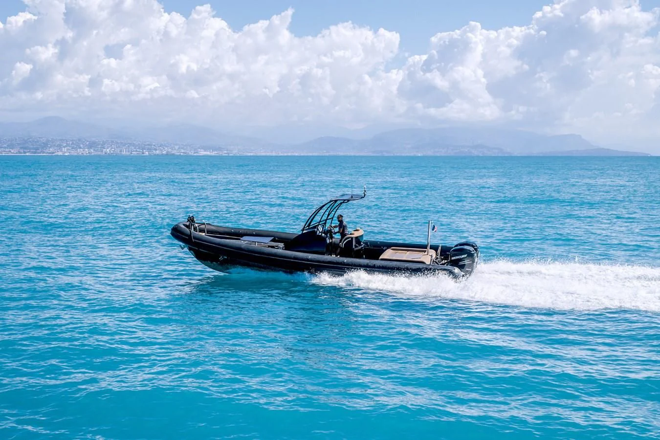 a boat in the water aboard FAST & FURIOUS Yacht for Charter