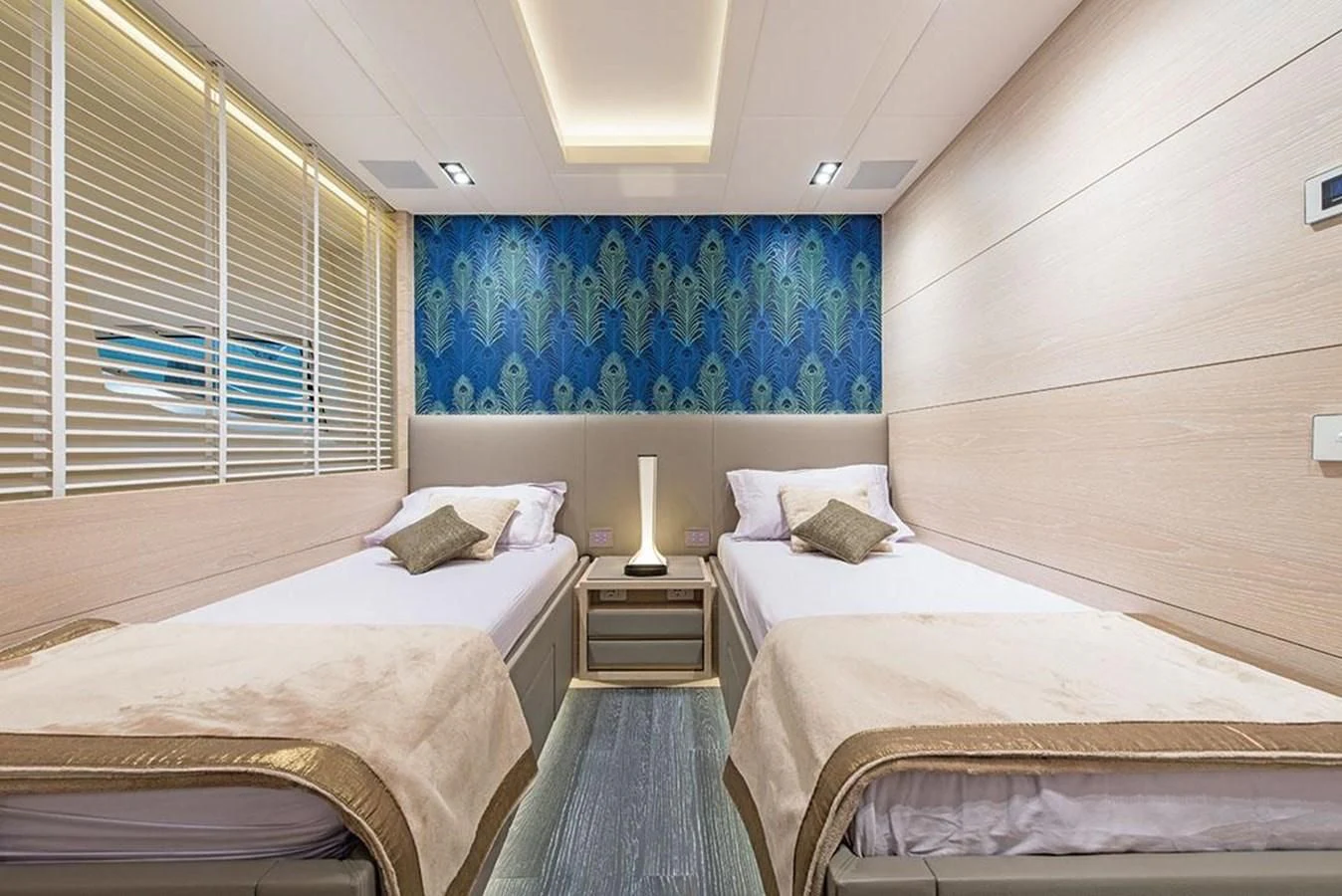 a couple of beds in a room aboard FAST & FURIOUS Yacht for Charter