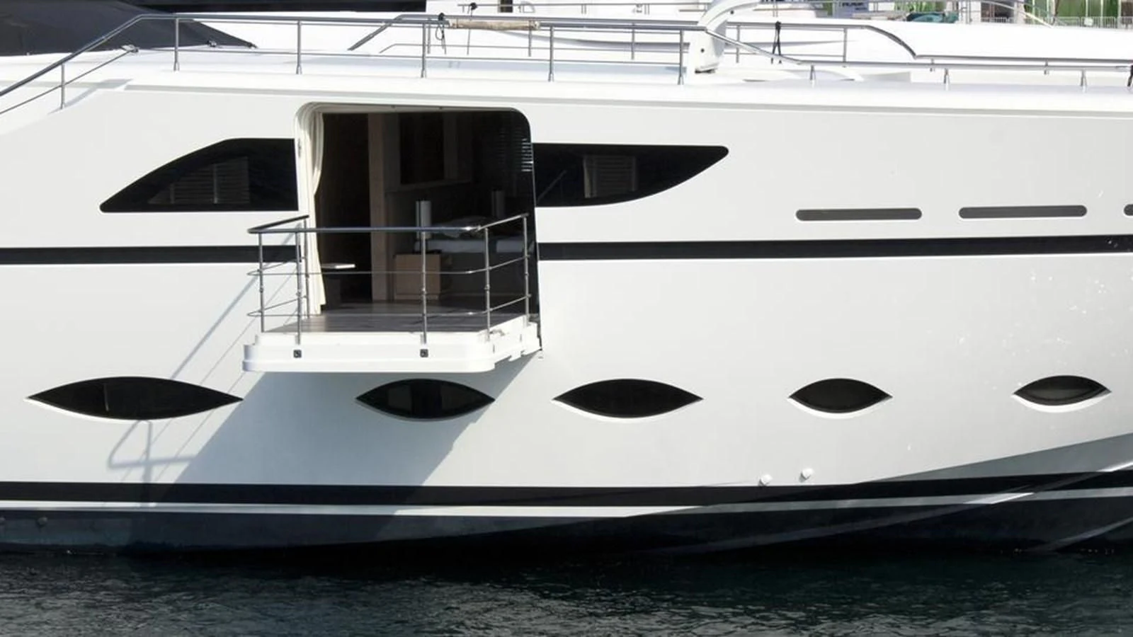 a white yacht on the water aboard FAST & FURIOUS Yacht for Charter
