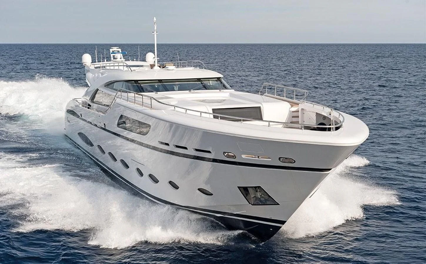 a white yacht on the water aboard FAST & FURIOUS Yacht for Charter