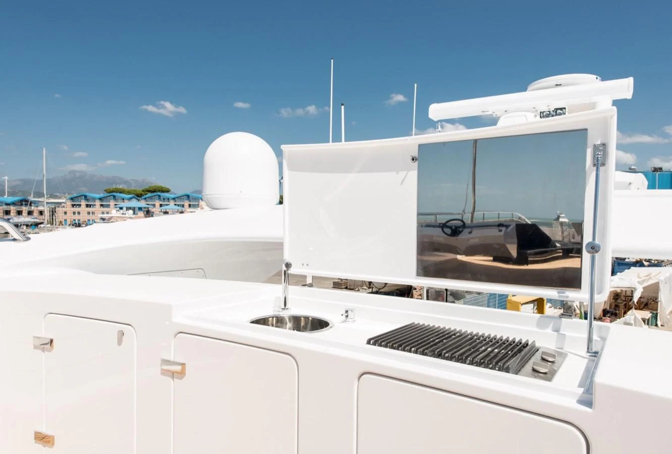 a white boat with a white roof aboard FAST & FURIOUS Yacht for Charter